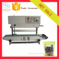 Continuous date printed heat sealing machine for food packing